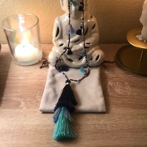 Used Pom Pom blue necklace